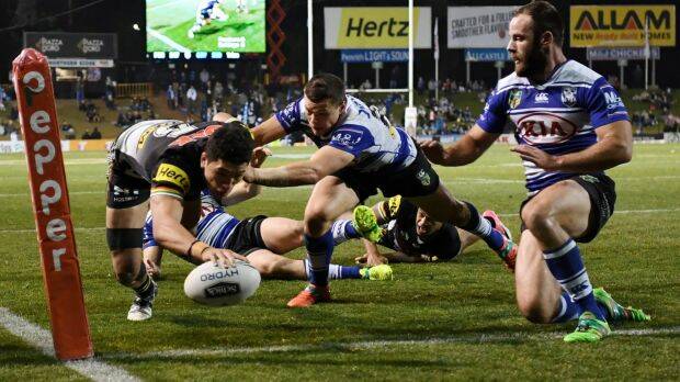 Try time: Dallin Watene-Zelezniak touches down to give Penrith the lead in the second half. Photo: AAP