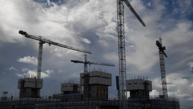 Residential construction fell in the latest quarter and economists at UBS expect the trend to continue. Photo: Louise Kennerley