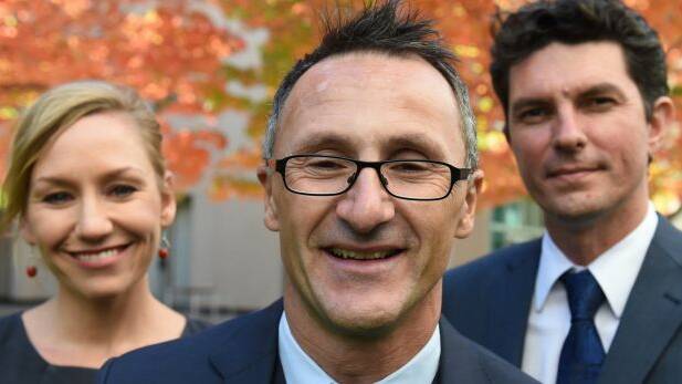 Greens leader Richard Di Natale (centre) has now lost two of his senators to dual citizenship confusion, Larissa Waters and Scott Ludlam.  Photo: Mick Tsikas
