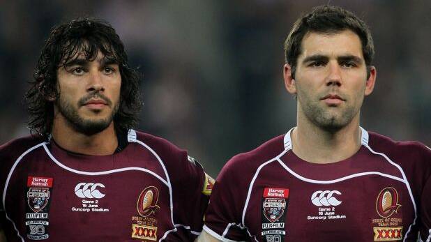 Plenty of history between them: Johnathan Thurston and Cameron Smith, pictured in 2010. Photo: Getty Images