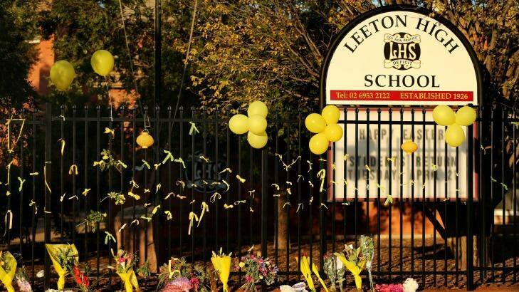 The fence at Leeton High School was transformed into a makeshift memorial for Stephanie Scott in the days after her death. Photo: Kate Geraghty