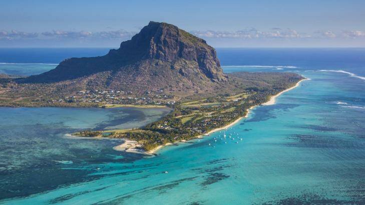 Arriving by air, the turquoise seas and verdant landscape of Mauritius are full of holiday promise. Photo: Jon Arnold