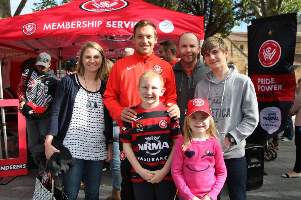 Happy faces: Western Sydney Wanderers striker Brendon Santalab with a group of fans at the community season launch in Parramatta. Pictures: Sam Venn 