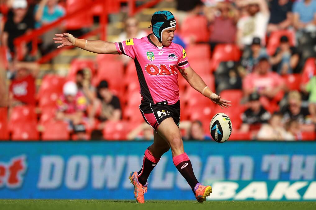 SYDNEY, AUSTRALIA - MARCH 08:  Jamie Soward of the Panthers kicks the ball during the round one NRL match between the Penrith Panthers and the Newcastle Knights at Sportingbet Stadium on March 8, 2014 in Sydney, Australia.  (Photo by Matt Blyth/Getty Images)