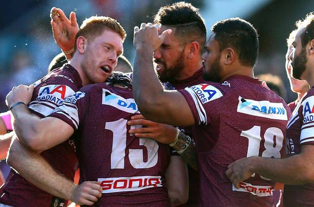SYDNEY, AUSTRALIA - AUGUST 31:  Manly celebrate the try of Tom Symonds during the round 25 NRL match between the Manly Sea Eagles and the Penrith Panthers at Brookvale Oval on August 31, 2014 in Sydney, Australia.  (Photo by Renee McKay/Getty Images) Photo: Renee McKay