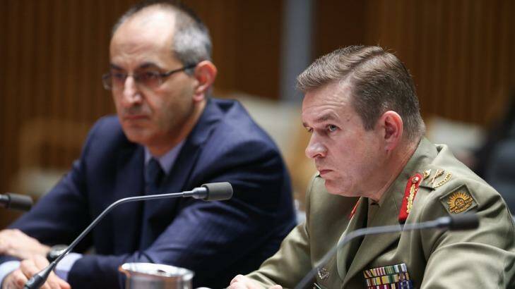 Major-General Andrew Bottrell (right), of Operation Sovereign Borders, at the hearing. Photo: Alex Ellinghausen