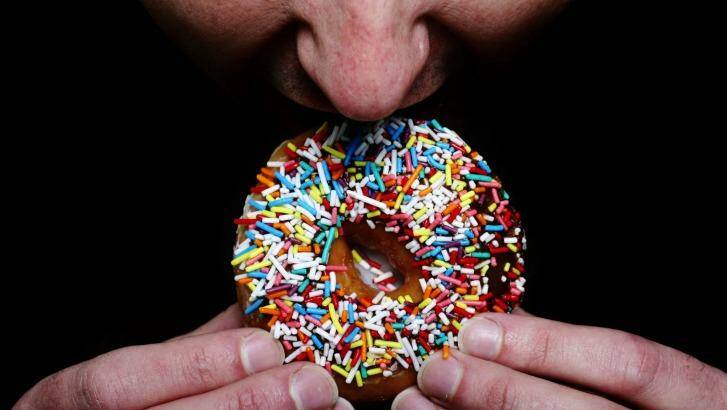 Many Australians are having "larger portions of junk food, more often", a survey has found. Photo: Andrew Quilty