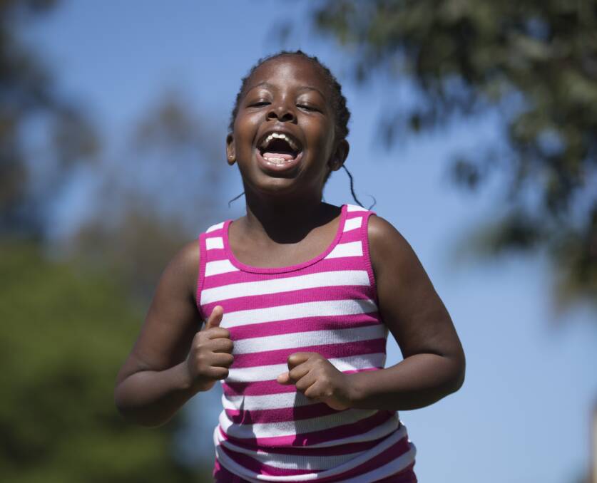 Happy and healthy: Taking part in the Go4Fun program has changed Princess Moyo's life. "She was disappointed when the program ended," mum Anna said. Picture: Geoff Jones