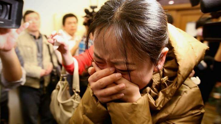 Anguish when relatives learned the plane was missing on March 9, 2014 in Beijing, China. Photo: Feng Li/Getty