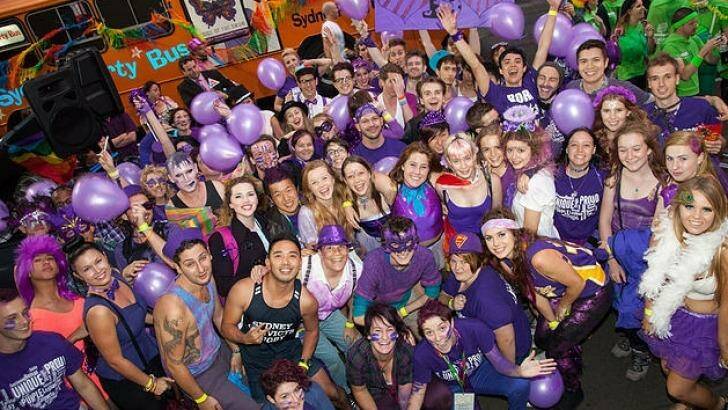 People dress up for a Wear It Purple day event.