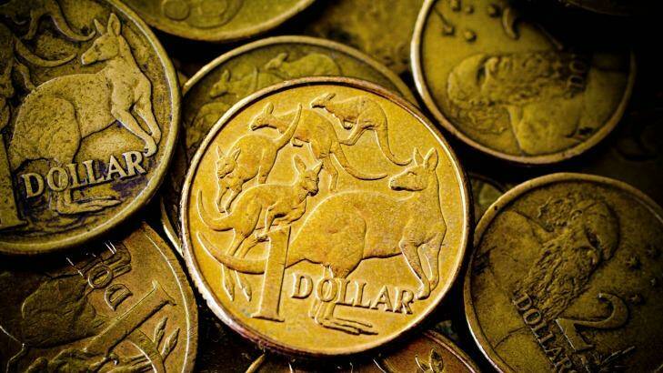 A dollar for your thoughts: With greenbacks so cheap to borrow, speculators use them to buy Australian government bonds. Photo: Glenn Hunt 