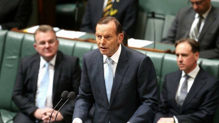 Prime Minister Tony Abbott said asylum seekers would begin to be settled in Papua New Guinea three months ago, but this is still yet to happen. Photo: Alex Ellinghausen