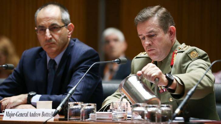 Michael Pezzullo, Secretary of the Department of Immigration and Border Protection, and Major-General Andrew Bottrell, Commander of Operation Sovereign Borders Joint Task Force, appear before the Legal and Constitutional Affairs References Committee.  Photo: Alex Ellinghausen