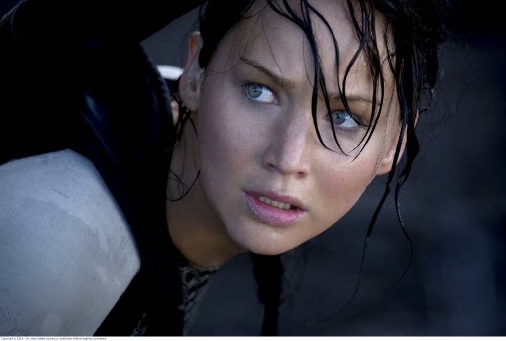 Jennifer Lawrence as Katniss Everdeen in The Hunger Games series.