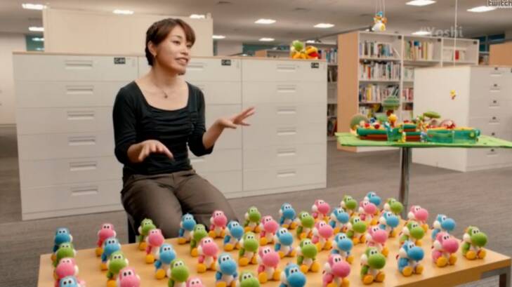 Software planner Emi Watanabe talks about here work on Yoshi's Wooly World. The plush, knitted amiibo toys were inspired by her attempt to mock up a real woolen Yoshi because he lacks to appropriate skills to create one in-game.