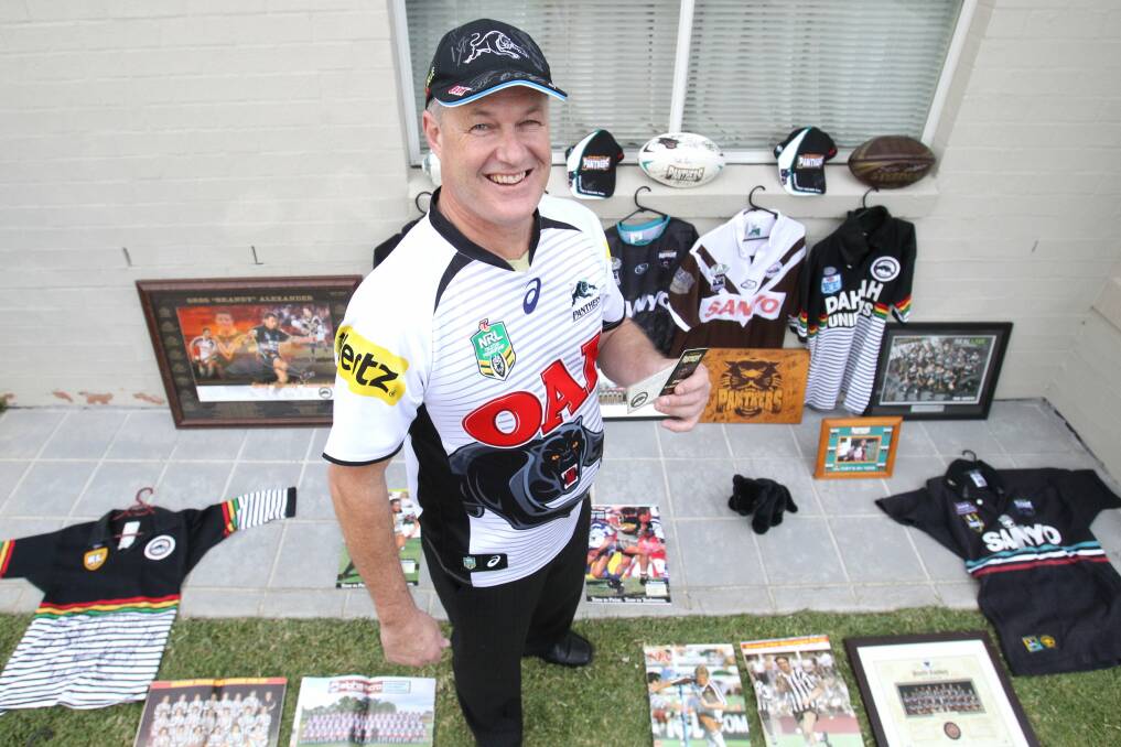 Panther pride: Michael Duffy shows off a selection of his Panthers memorabilia at his Ropes Crossing home Picture: Gene Ramirez