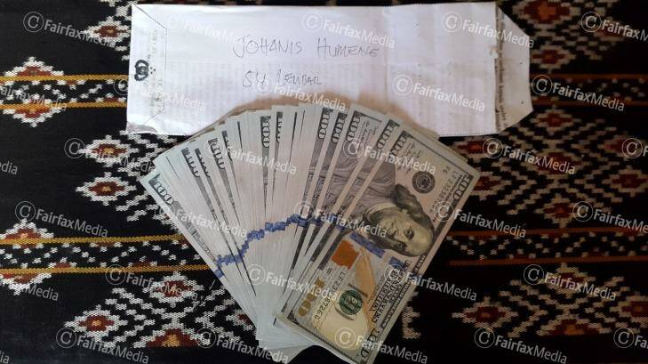 One of six: Money Indonesian police say was used to pay people traffickers. Photo: Supplied