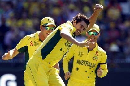 Australia's Mitchell Starc claims the scalp of New Zealand captain Brendon McCullum during the World Cup final on Sunday.  Photo: Brandon Malaone