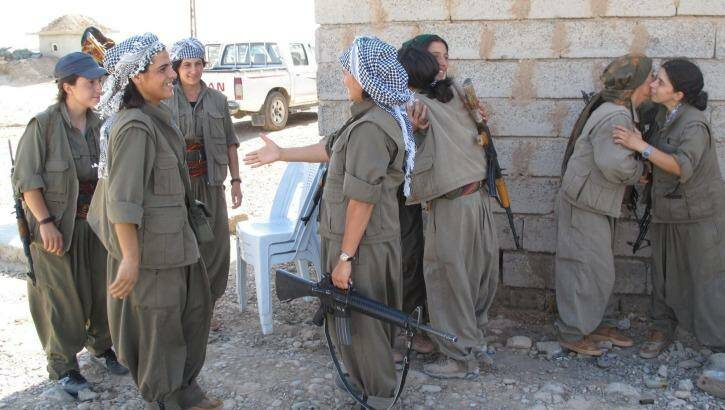 PKK fighters at the Daquq PKK base after a night gathering intelligence on the frontline. Photo: Ruth Pollard