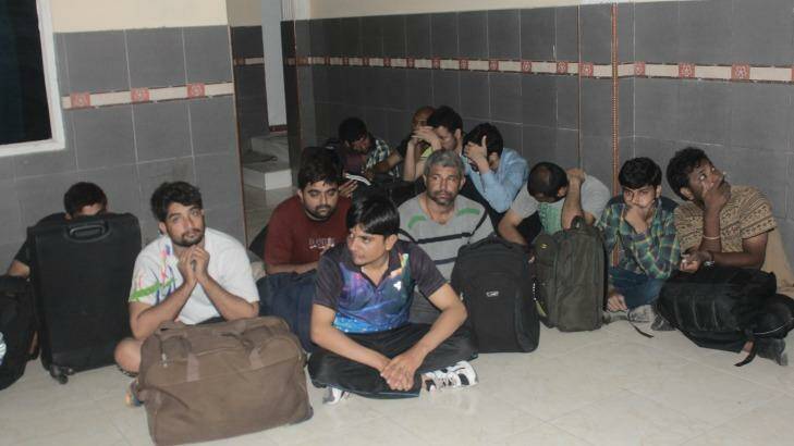 The male asylum seekers, who are from India, Nepal and Bangladesh, at Nusa Tenggara Timur police station. Photo: Supplied