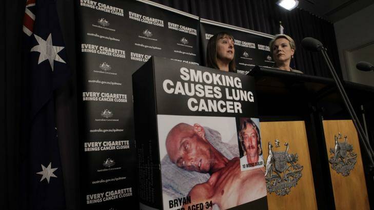 Fight to the last breath: then Labor attorney-general Nicola Roxon and health minister Tanya Plibersek respond to news of a High Court challange to their plain-packaging laws in 2012.  Photo: Andrew Meares