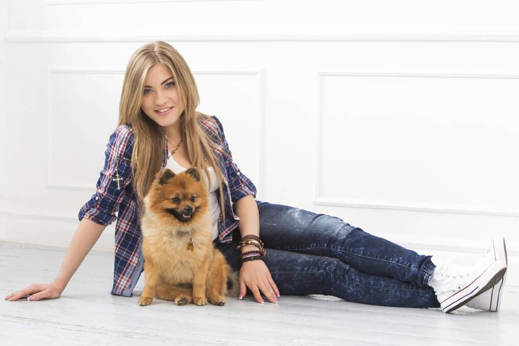 Beautiful woman with dog floor