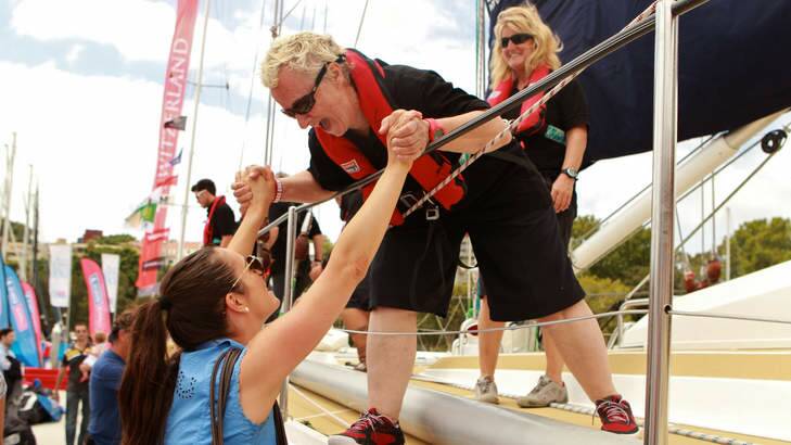 Julia Maguire welcomes her mum Jo Martin, who arrived into Sydney on board Team Garmin as part of the Clipper round the world yacht race on Saturday. Photo: Jacky Ghossein